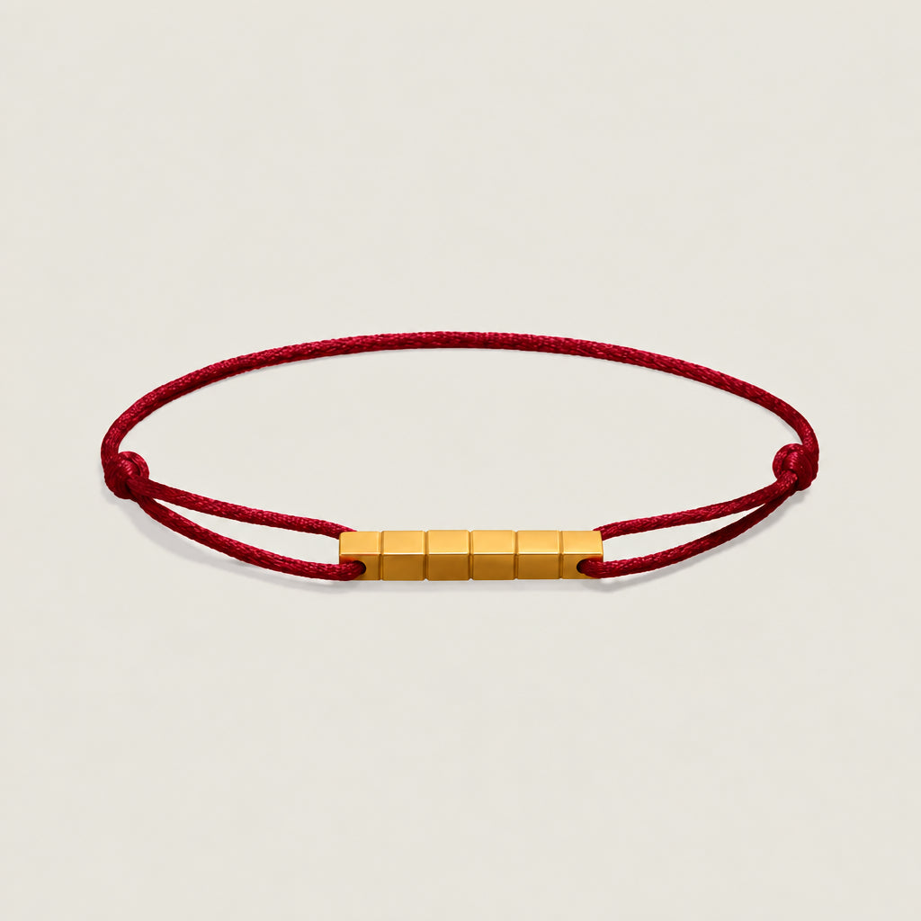 The Cube — OWYD silk cord bracelet with 18K gold-plated cube