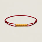 The Cube — OWYD silk cord bracelet with 18K gold-plated cube